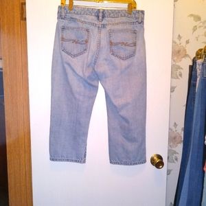 Worn but in great shape. Comfortable, great for lounging or playing with kids.